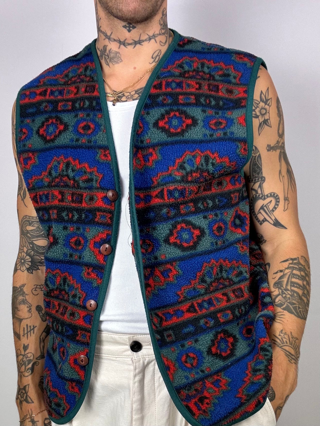 Blue/green/red patterned vest with buttons