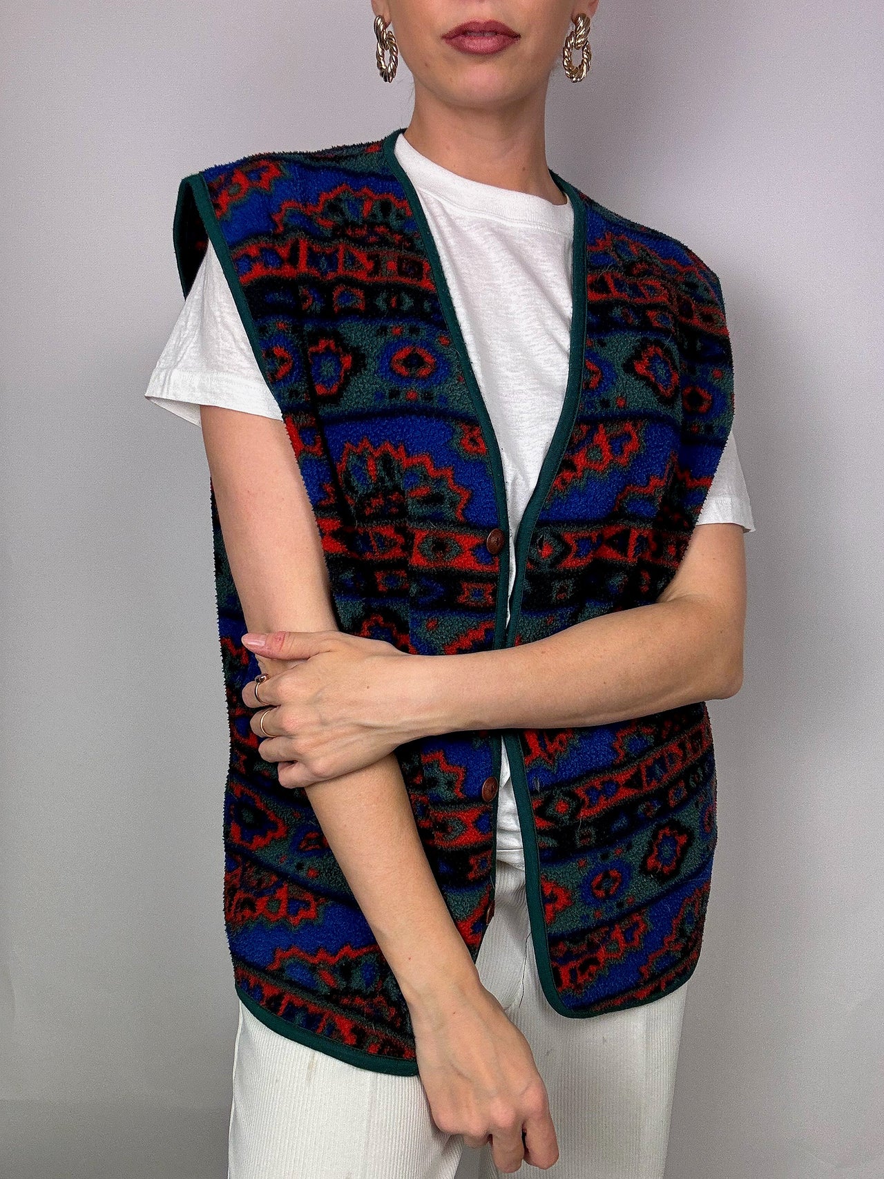 Blue/green/red patterned vest with buttons
