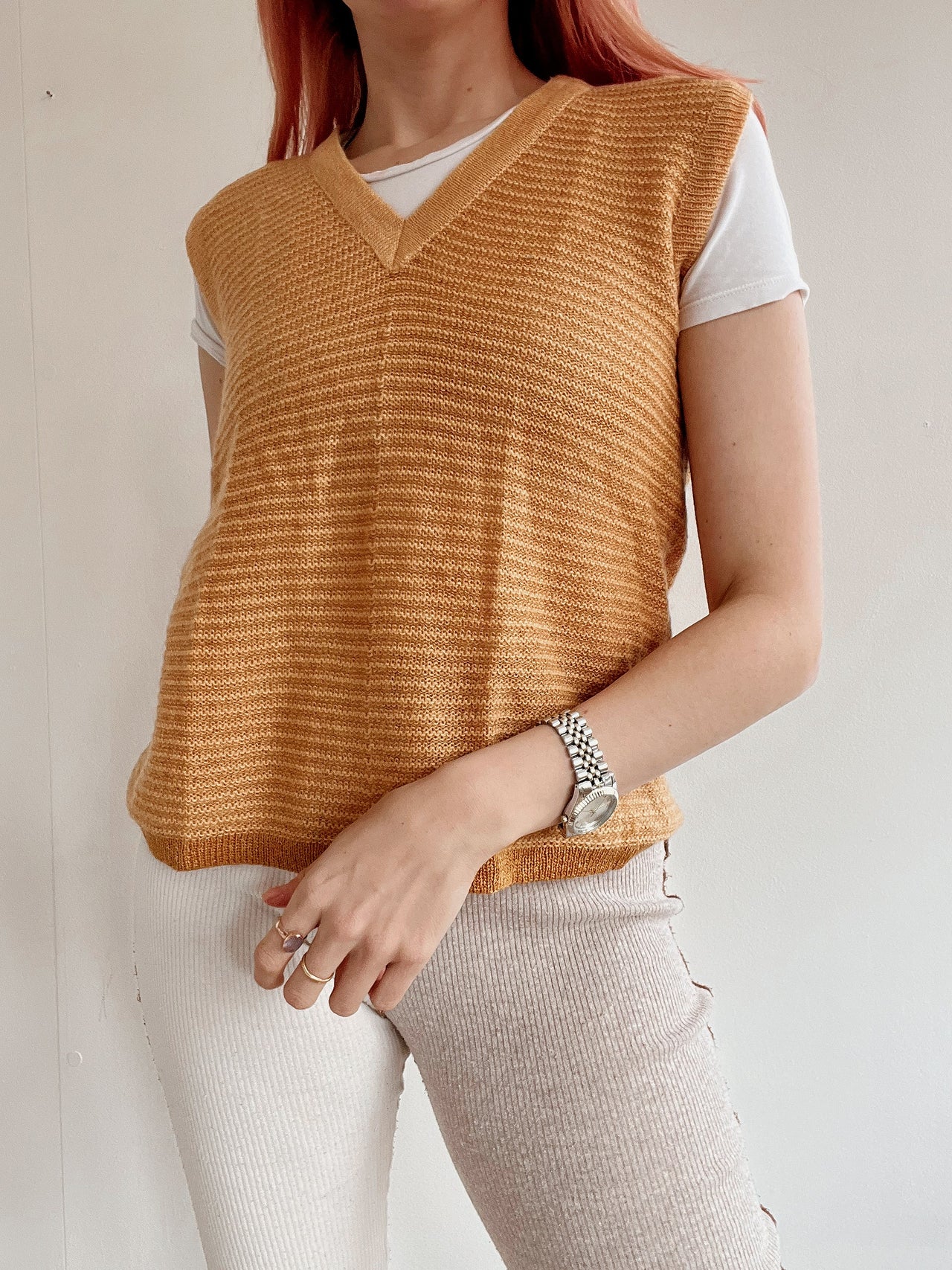 Black V-neck wool cardigan with pink/yellow pattern