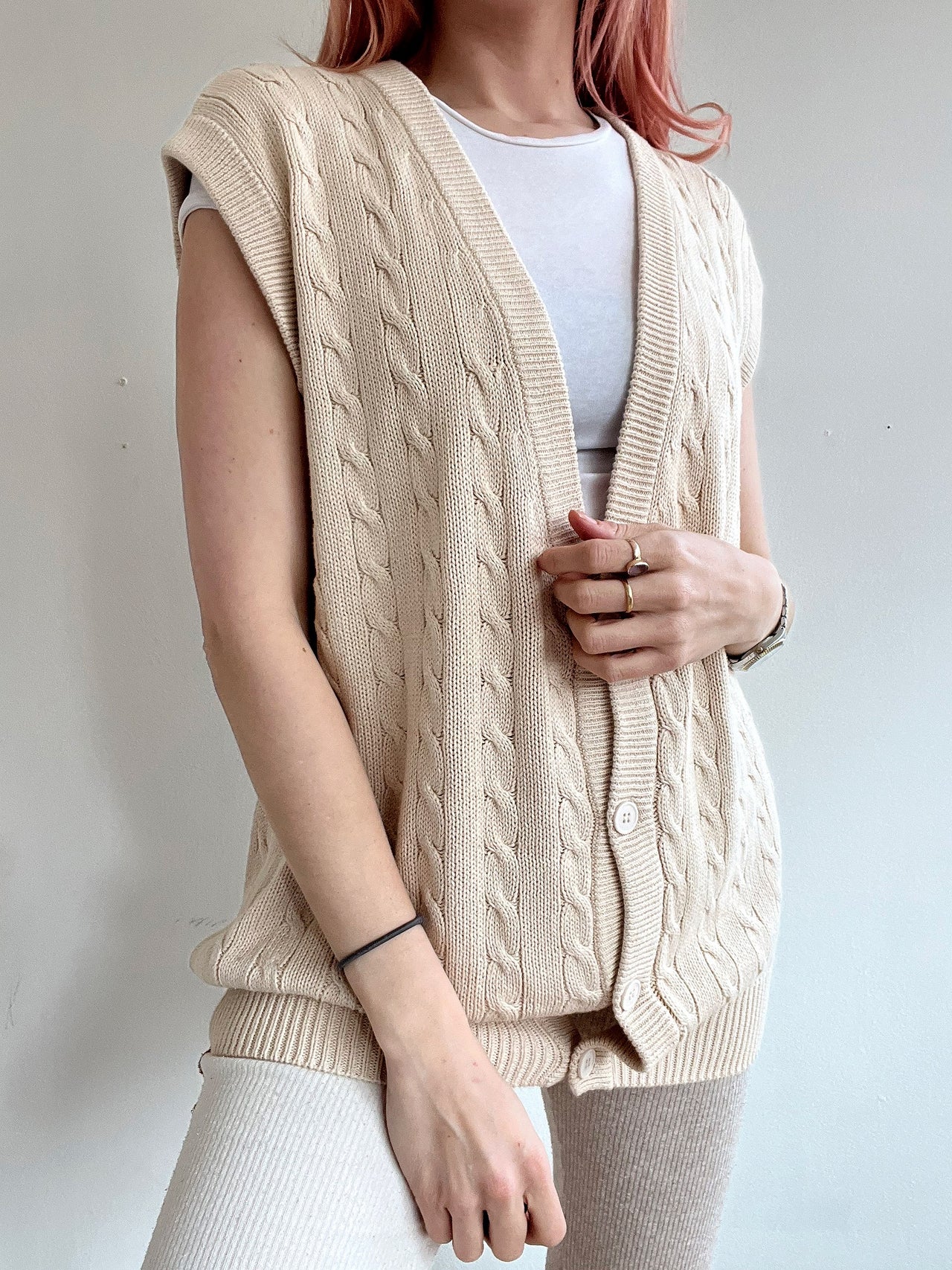 Black V-neck wool cardigan with pink/yellow pattern