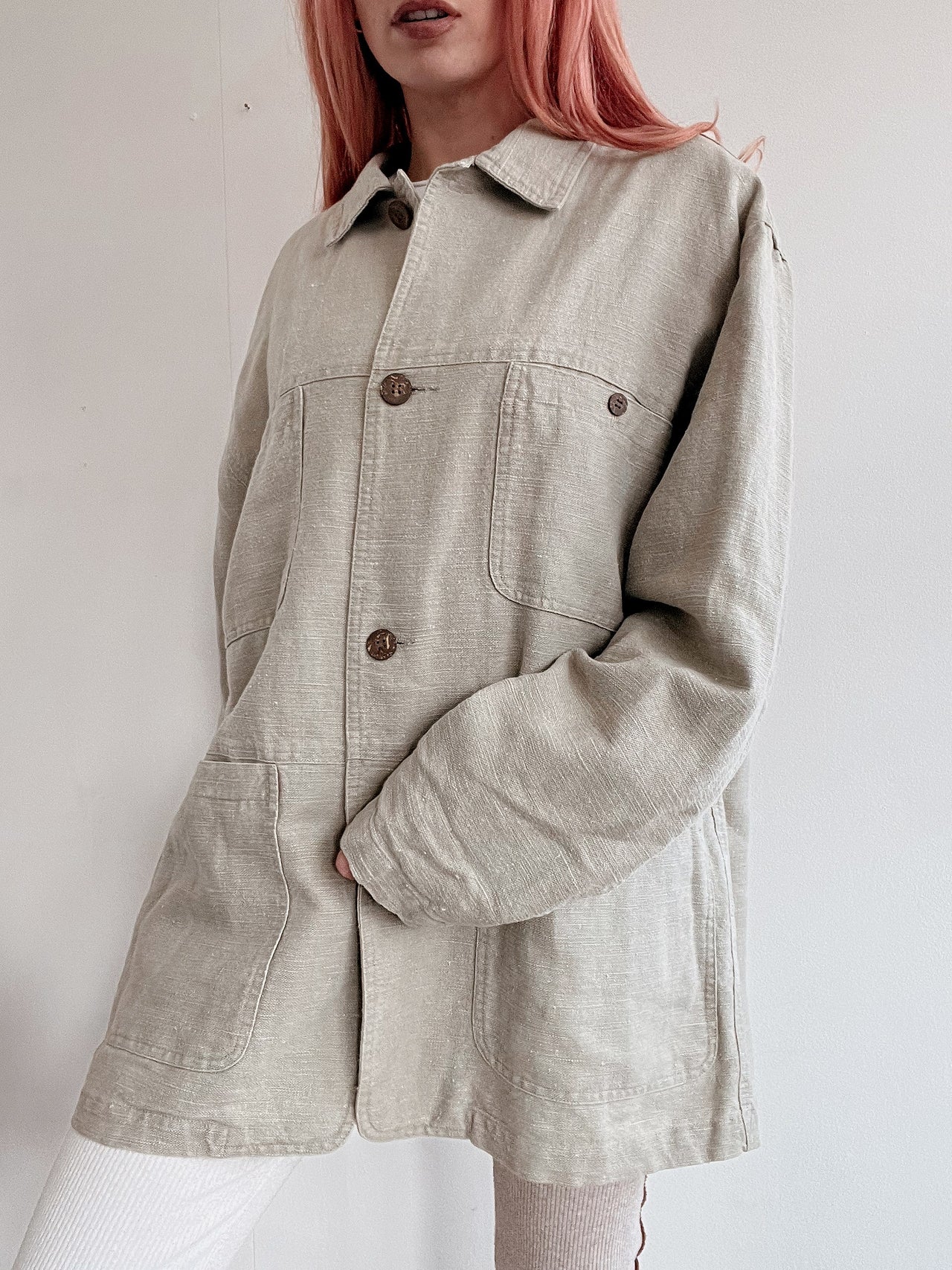 Black V-neck wool cardigan with pink/yellow pattern