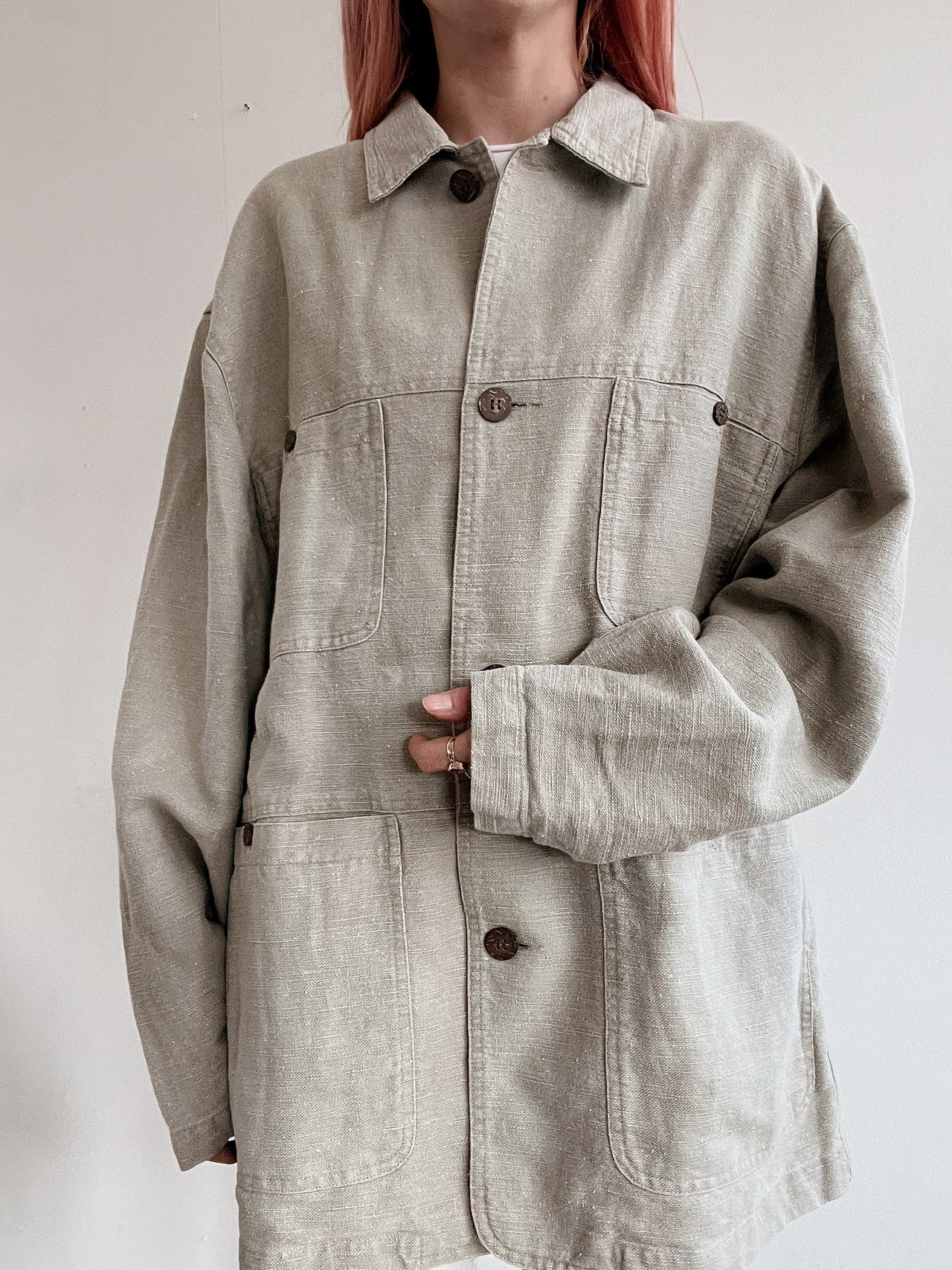 Black V-neck wool cardigan with pink/yellow pattern