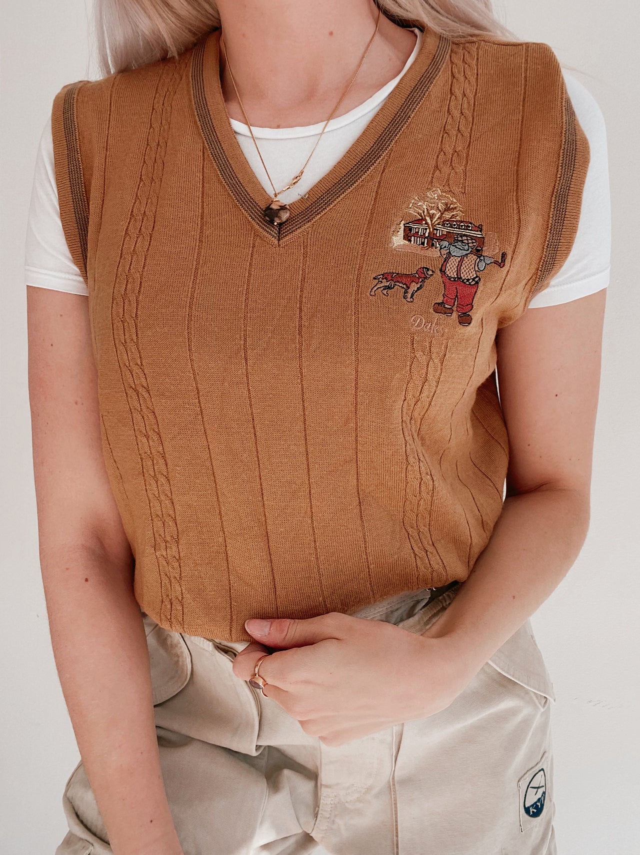 Black V-neck wool cardigan with pink/yellow pattern