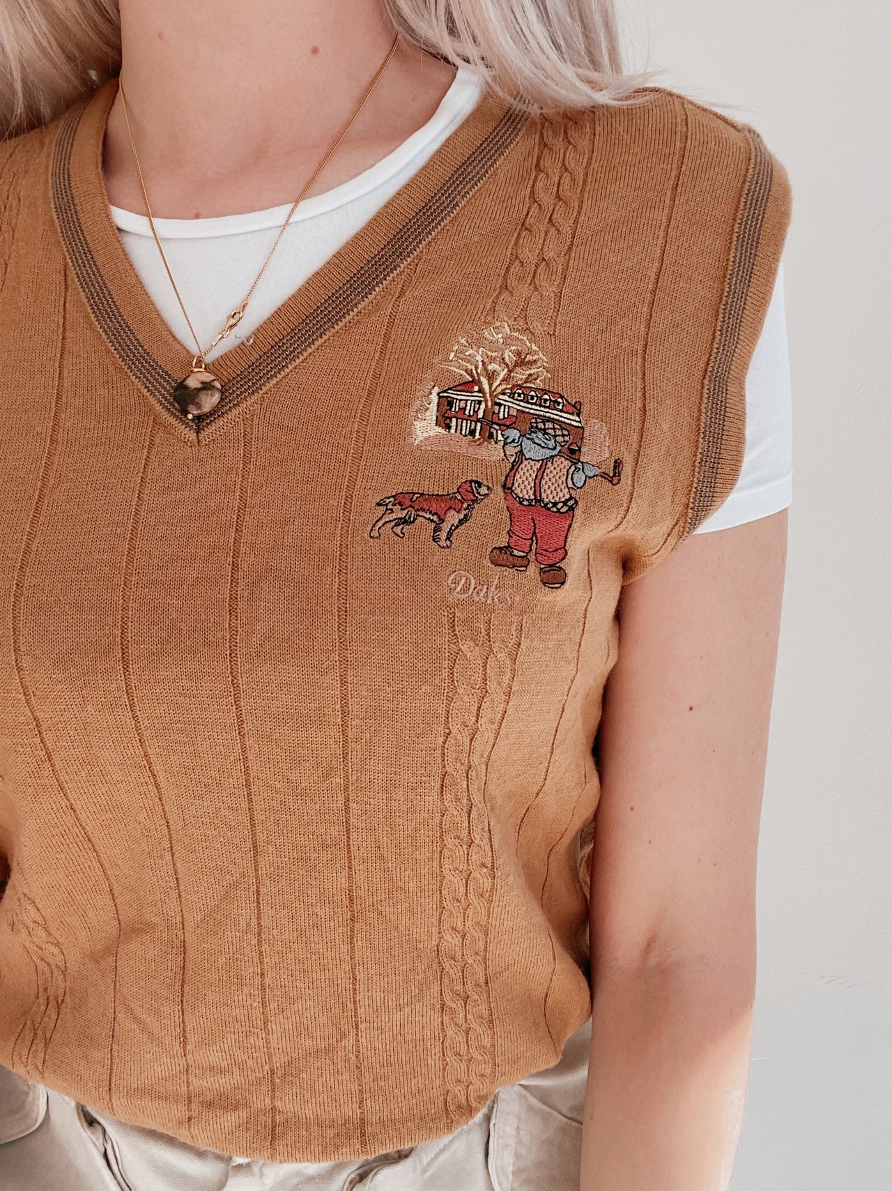 Black V-neck wool cardigan with pink/yellow pattern