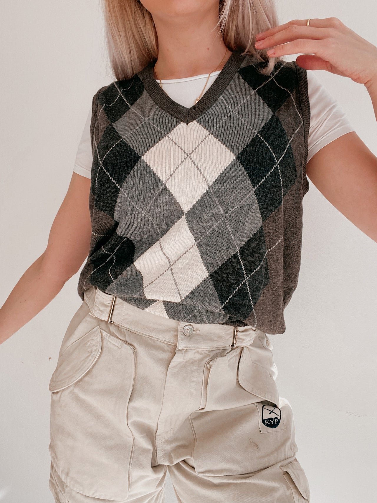 Black V-neck wool cardigan with pink/yellow pattern