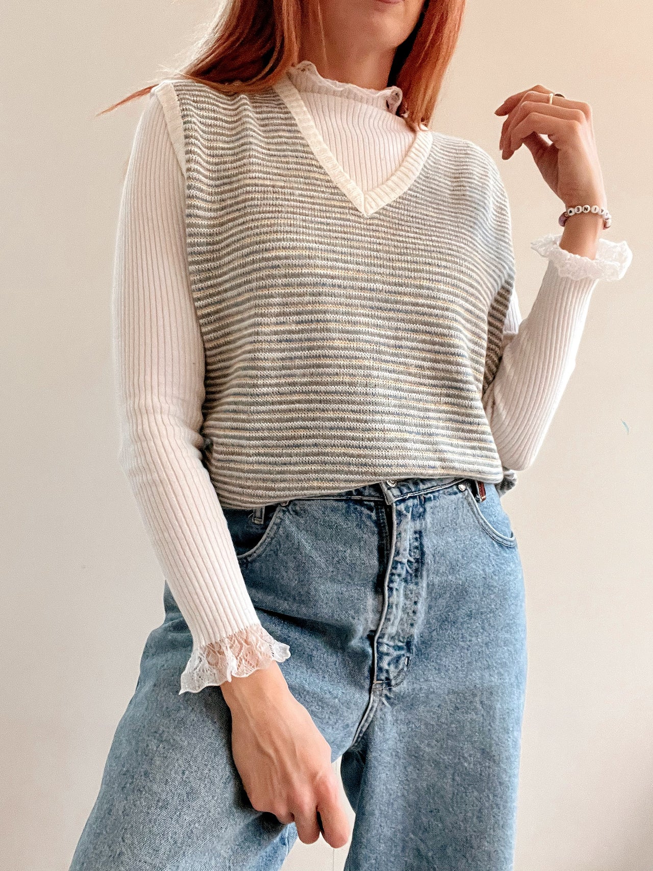 Black V-neck wool cardigan with pink/yellow pattern