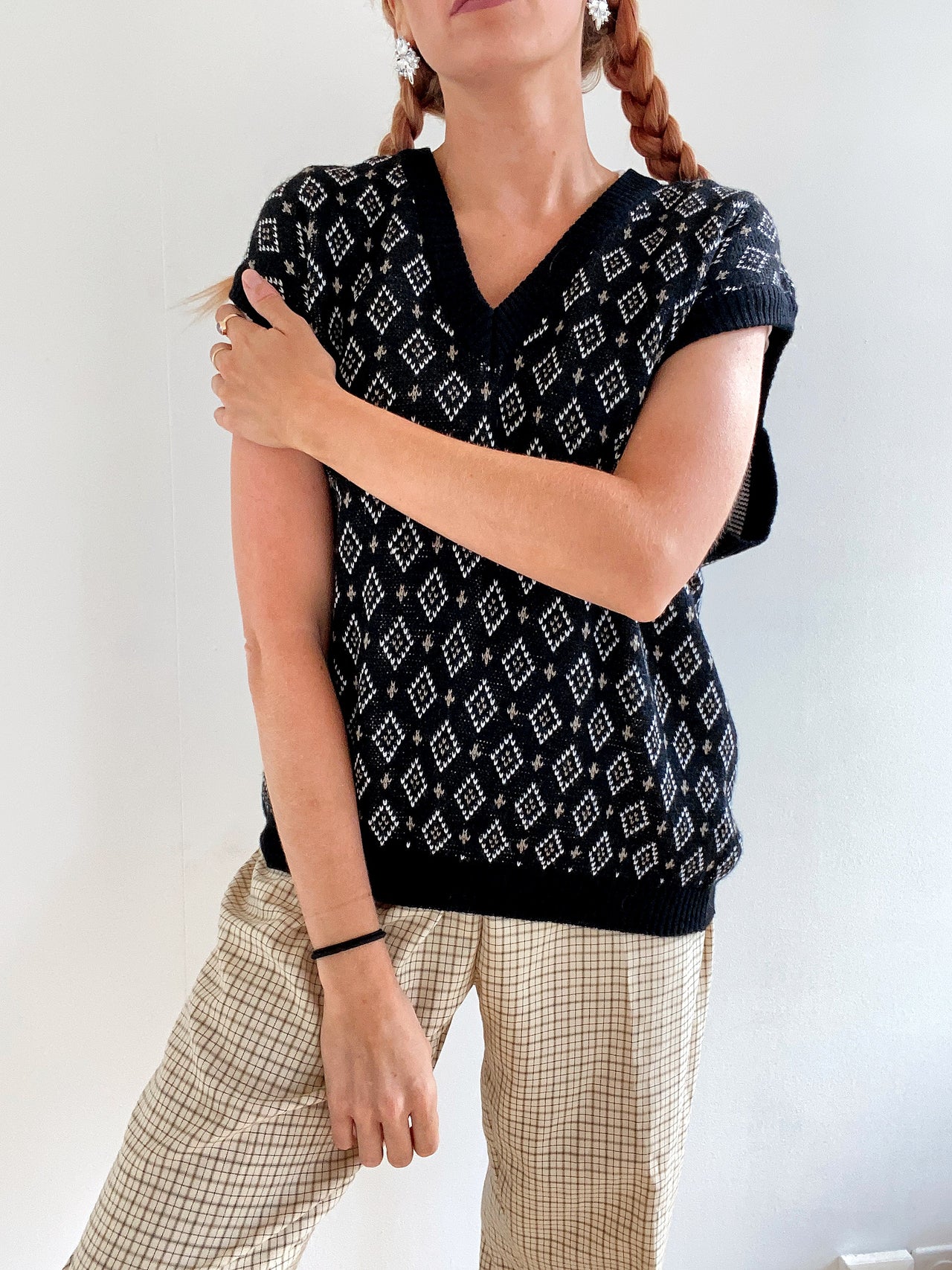 Black V-neck wool cardigan with pink/yellow pattern