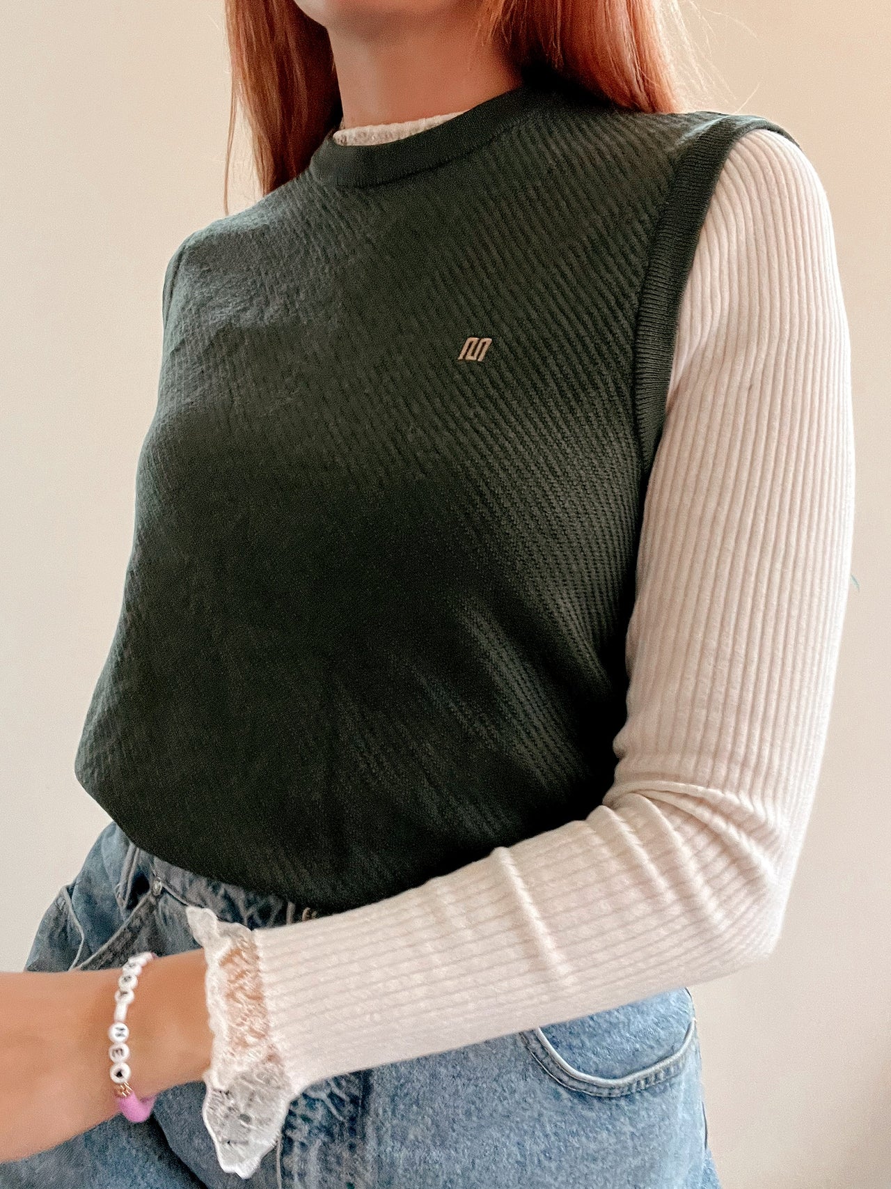 Black V-neck wool cardigan with pink/yellow pattern