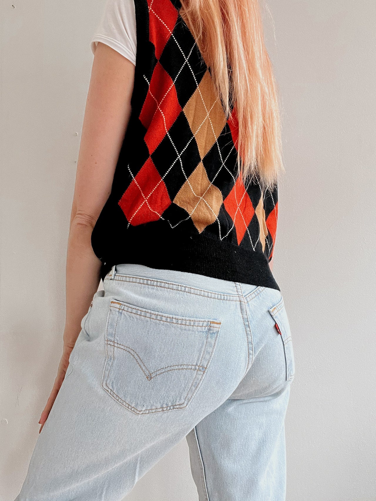 Black V-neck wool cardigan with pink/yellow pattern