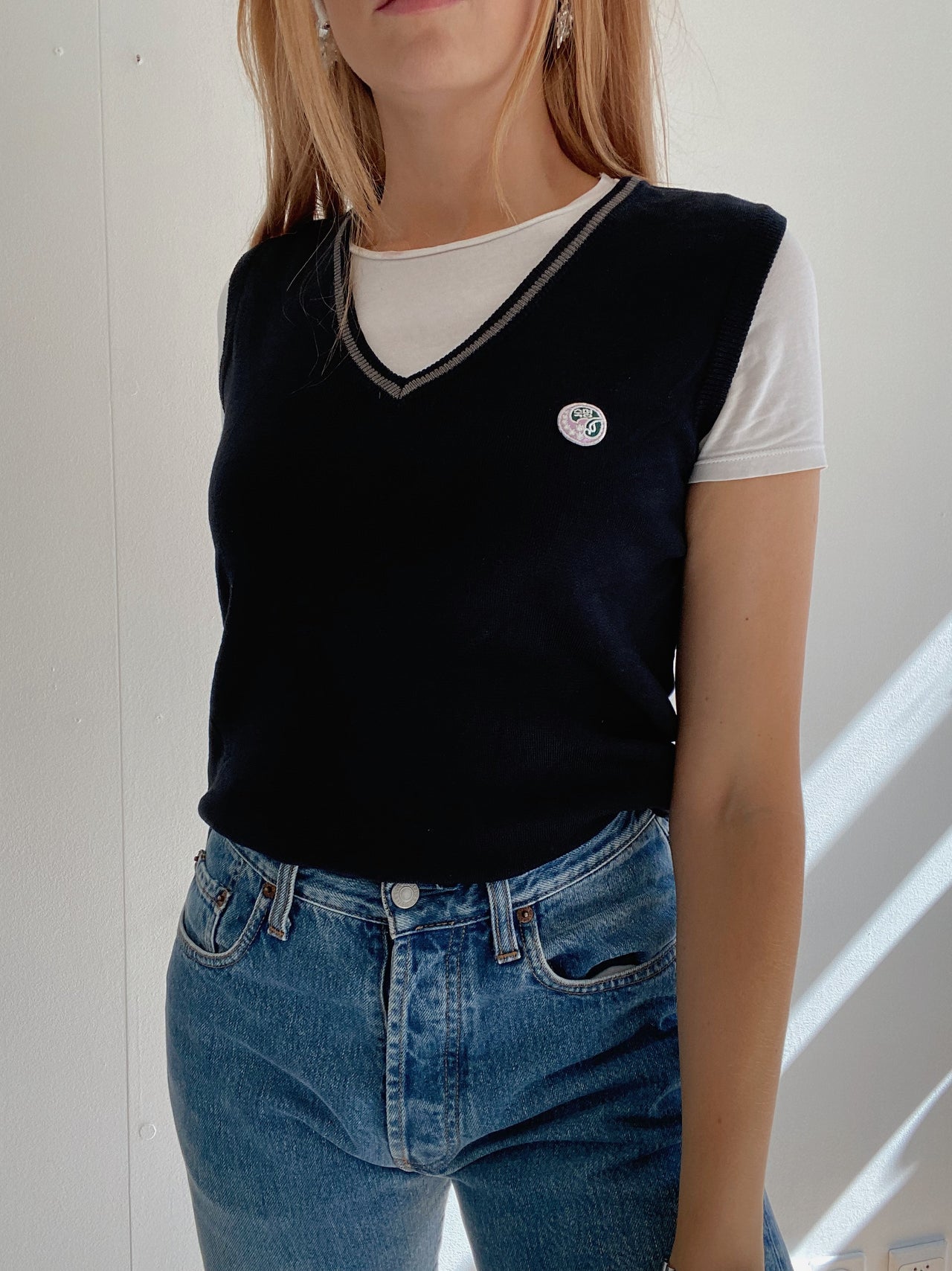 Black V-neck wool cardigan with pink/yellow pattern