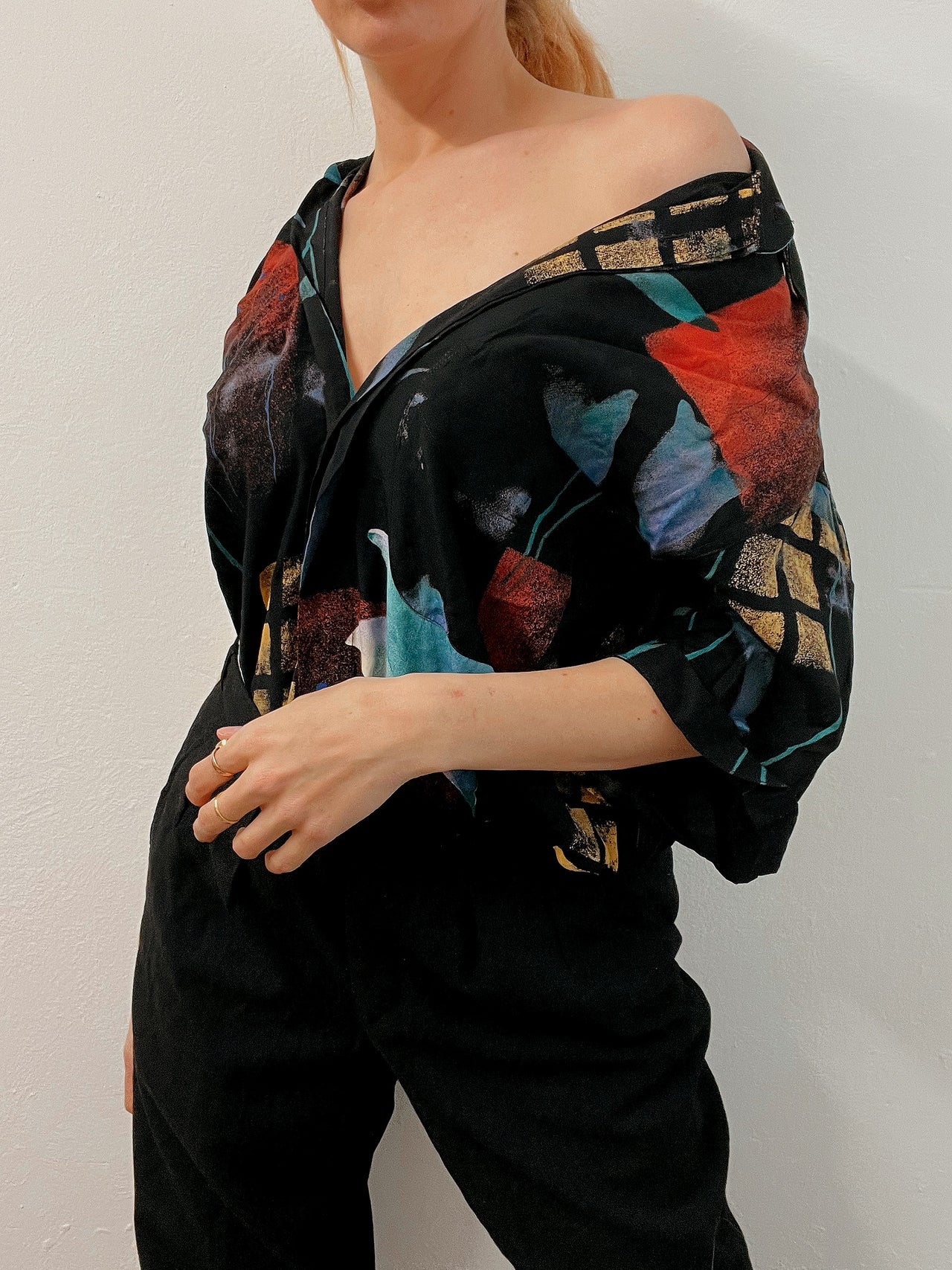 Black V-neck wool cardigan with pink/yellow pattern