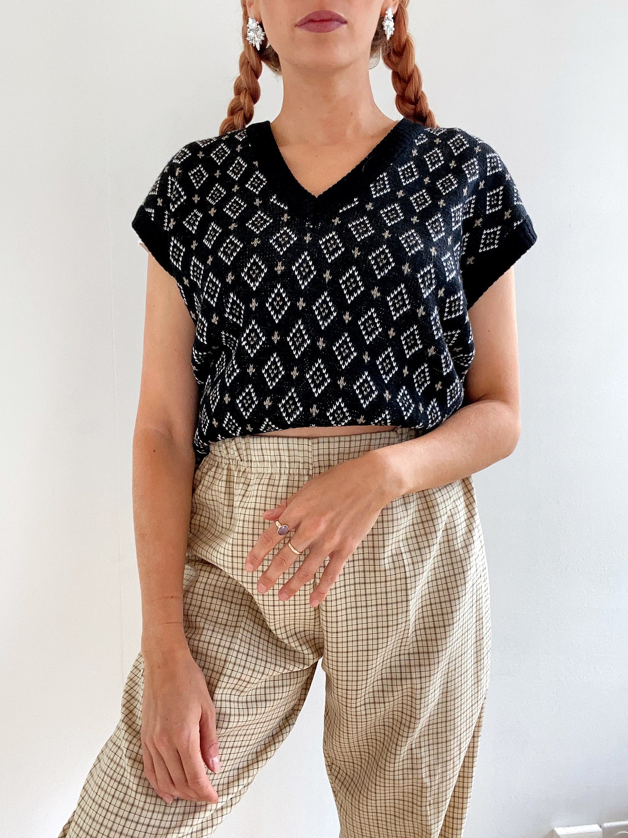 Black V-neck wool cardigan with pink/yellow pattern