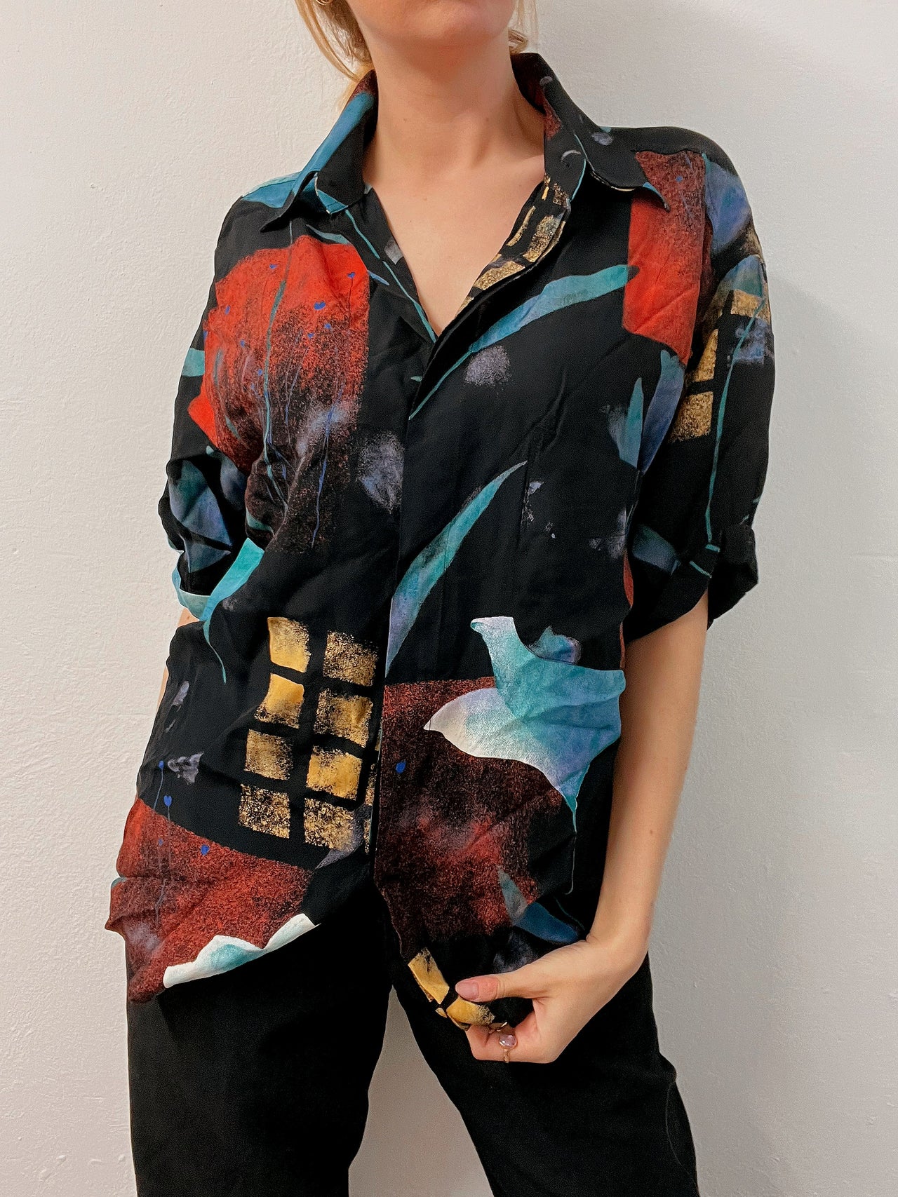 Black V-neck wool cardigan with pink/yellow pattern