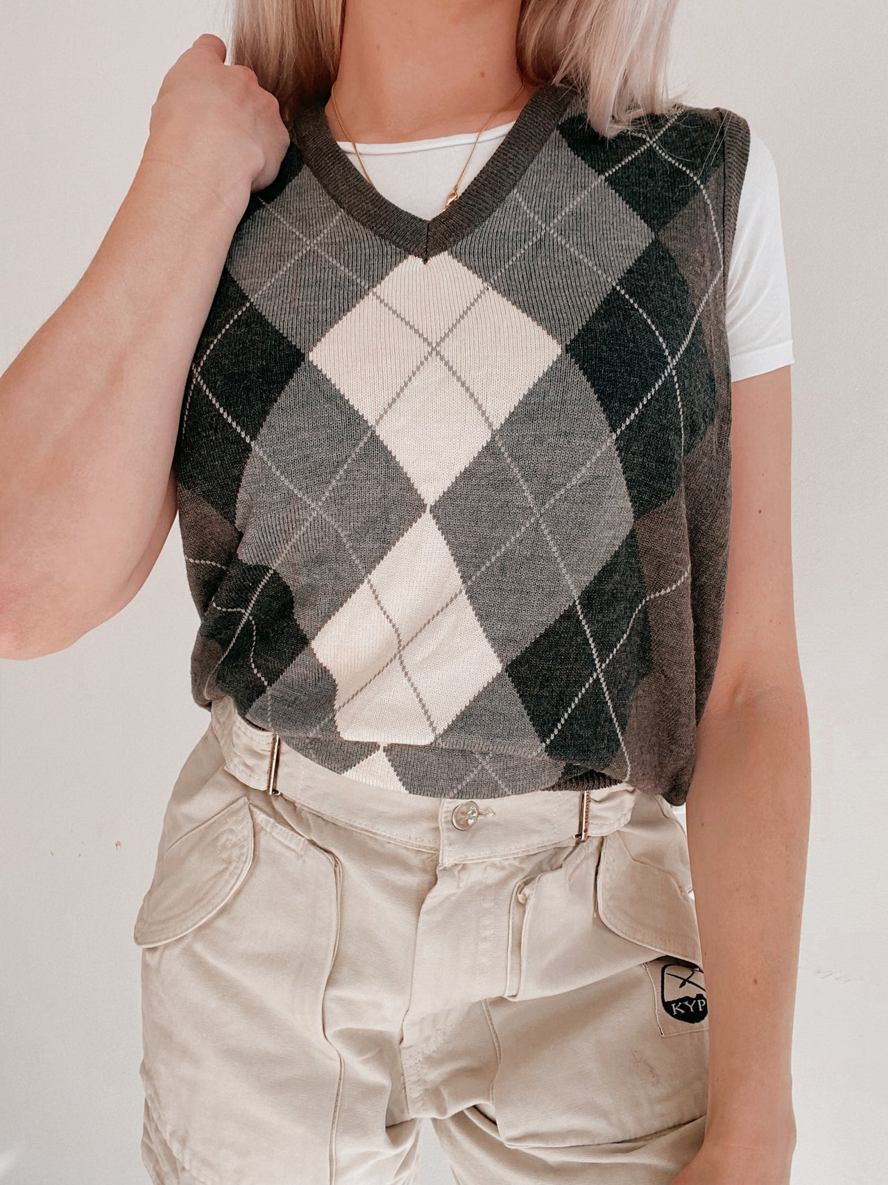 Black V-neck wool cardigan with pink/yellow pattern