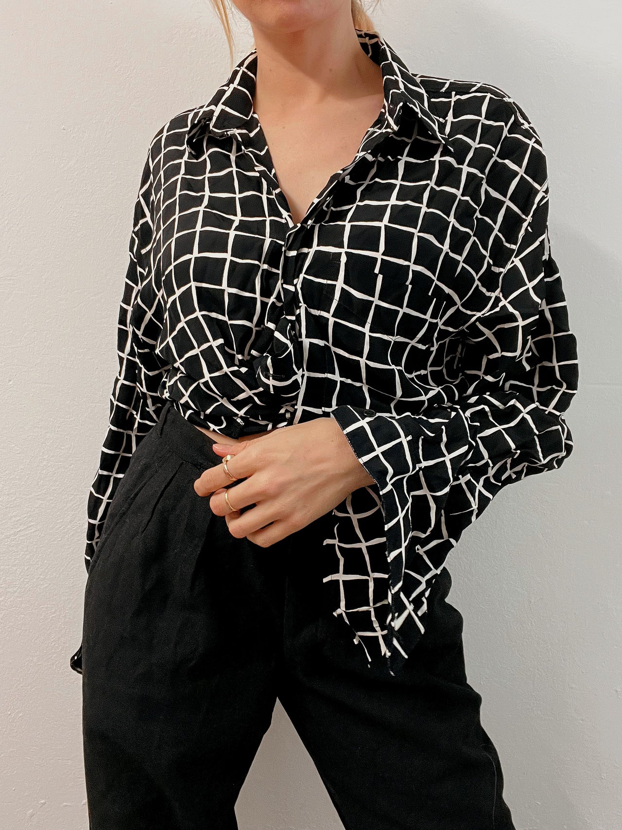 Black V-neck wool cardigan with pink/yellow pattern