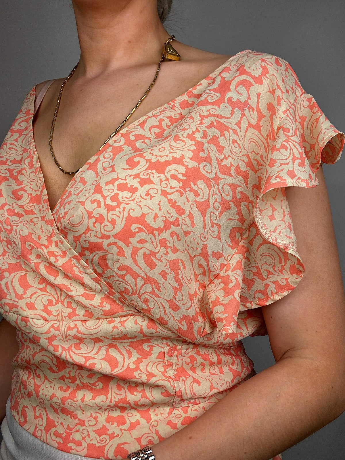 Pink blouse with beige pattern