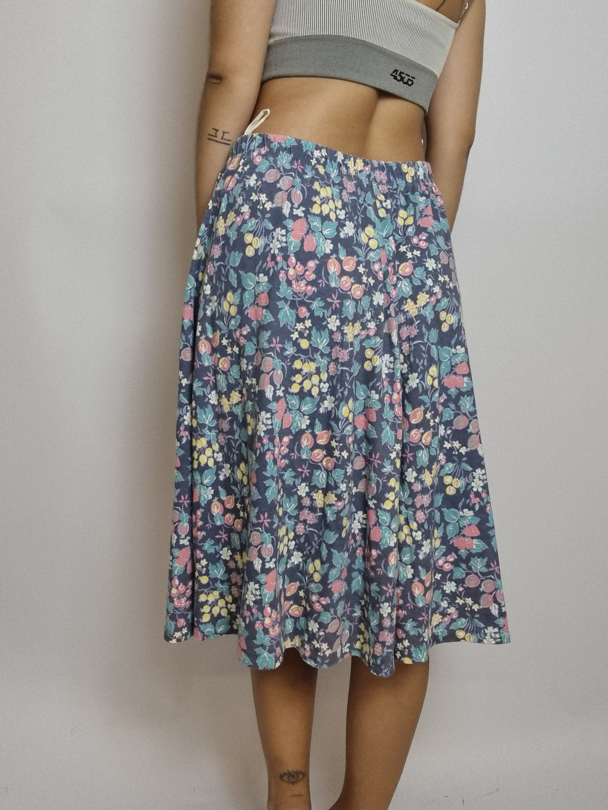 Jupe midi vintage bleue à fleurs colorées M