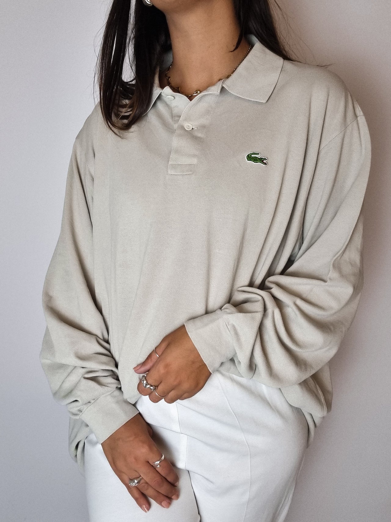 Polo Lacoste beige manches longues M