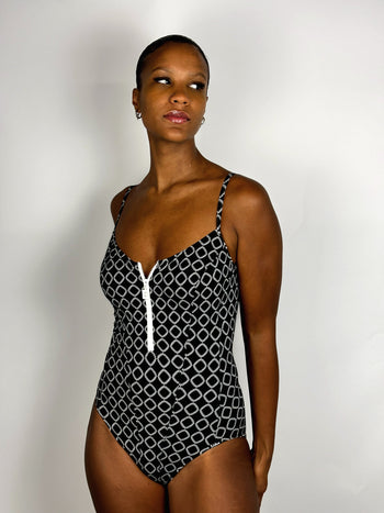 Black one-piece swimsuit with zipper and white pattern