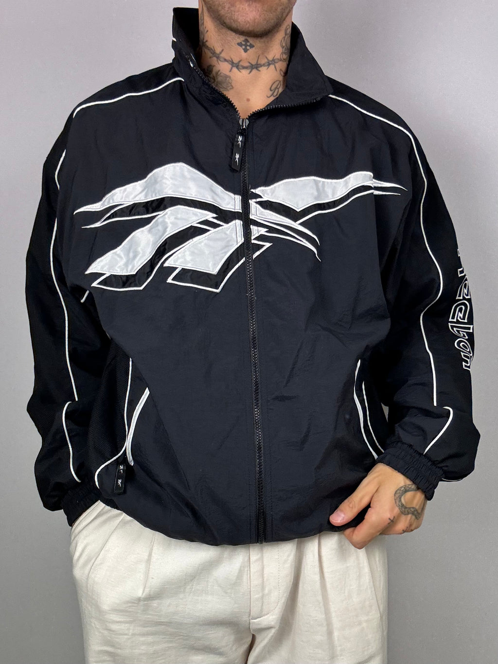 Reebok black and white jogging jacket