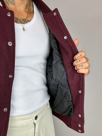 Burgundy and white bomber jacket with vintage leather sleeves