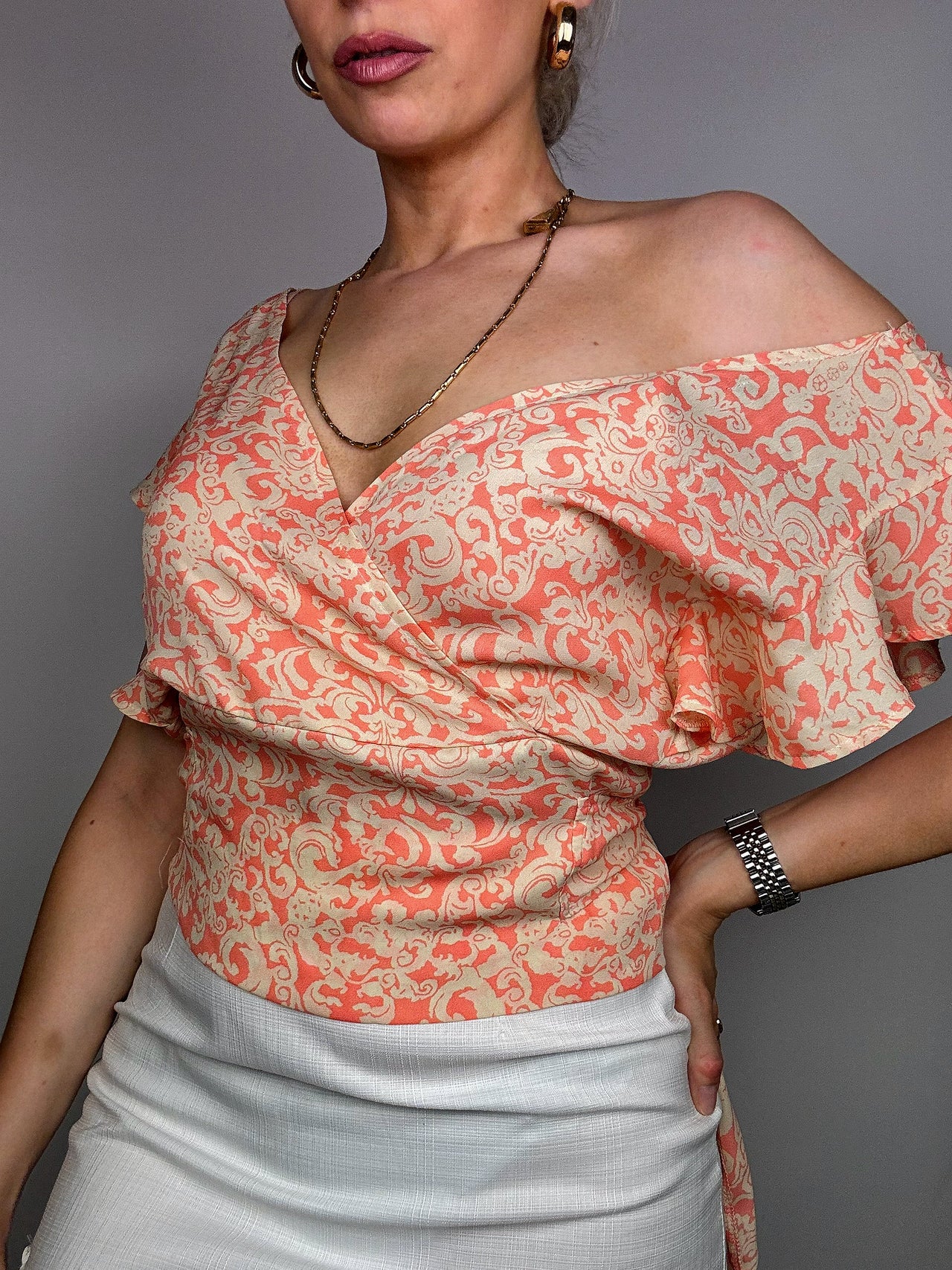 Pink blouse with beige pattern