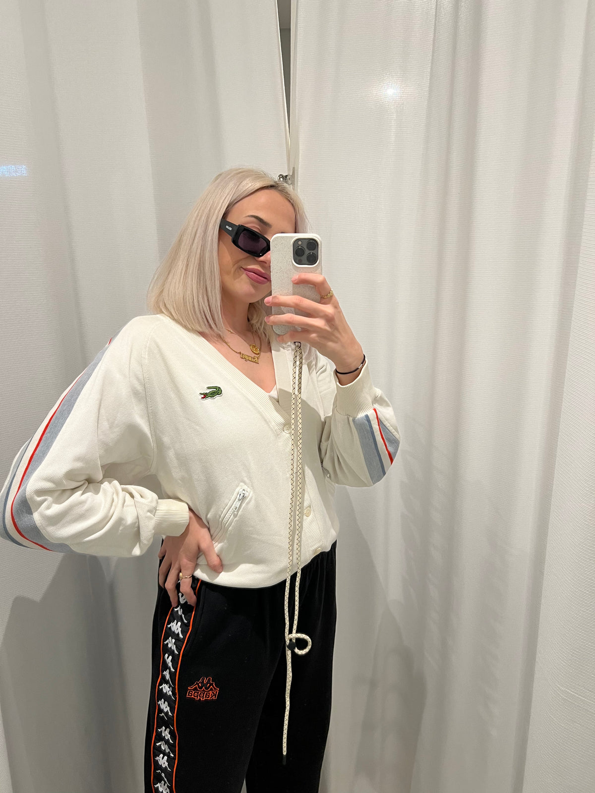 White Lacoste cardigan with stripes on the sleeves