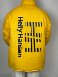 Dunkelblaue und gelbe Wende-Daunenjacke von Helly Hansen