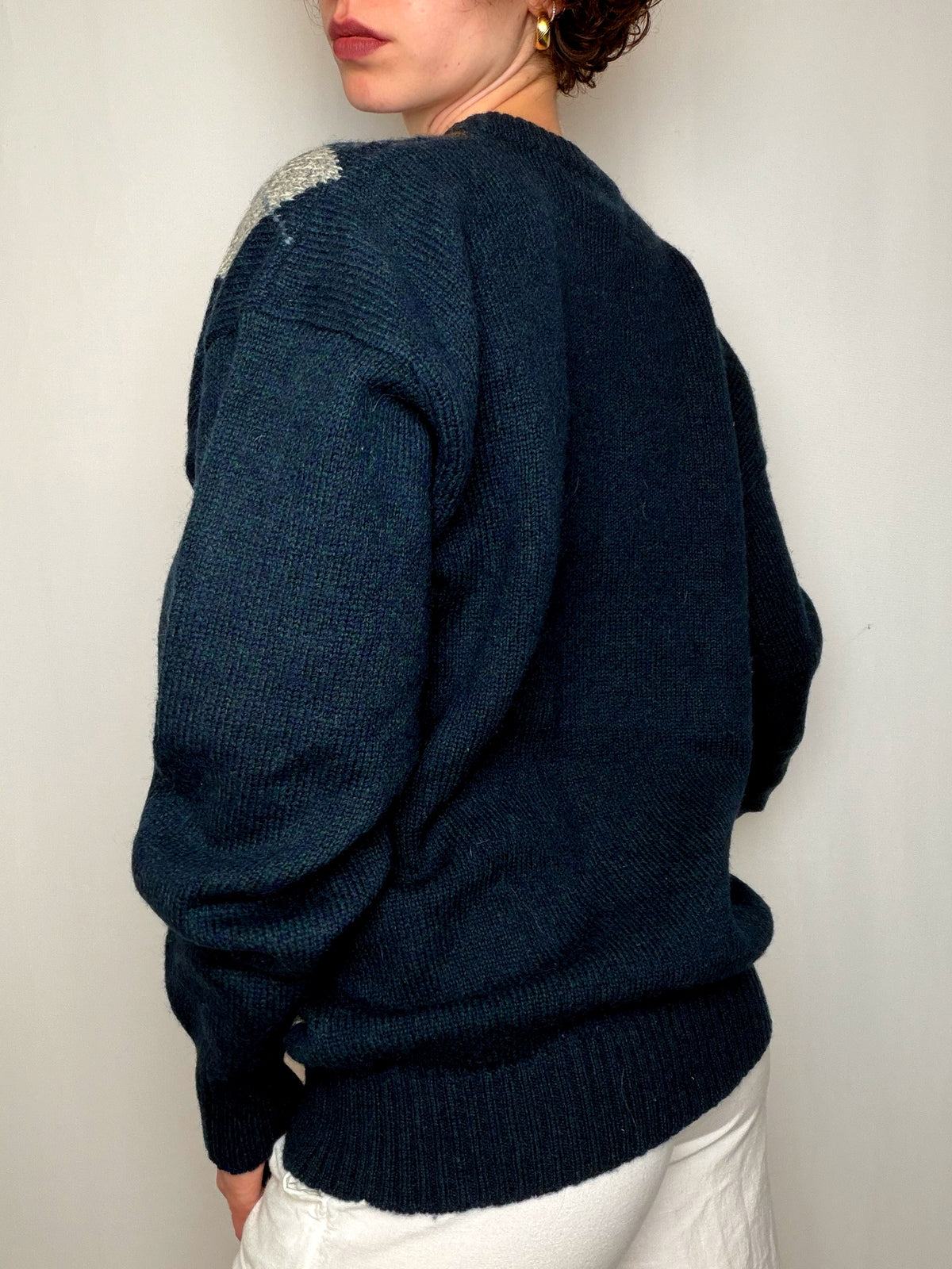 Pull bleu marine à motifs argyle vintage