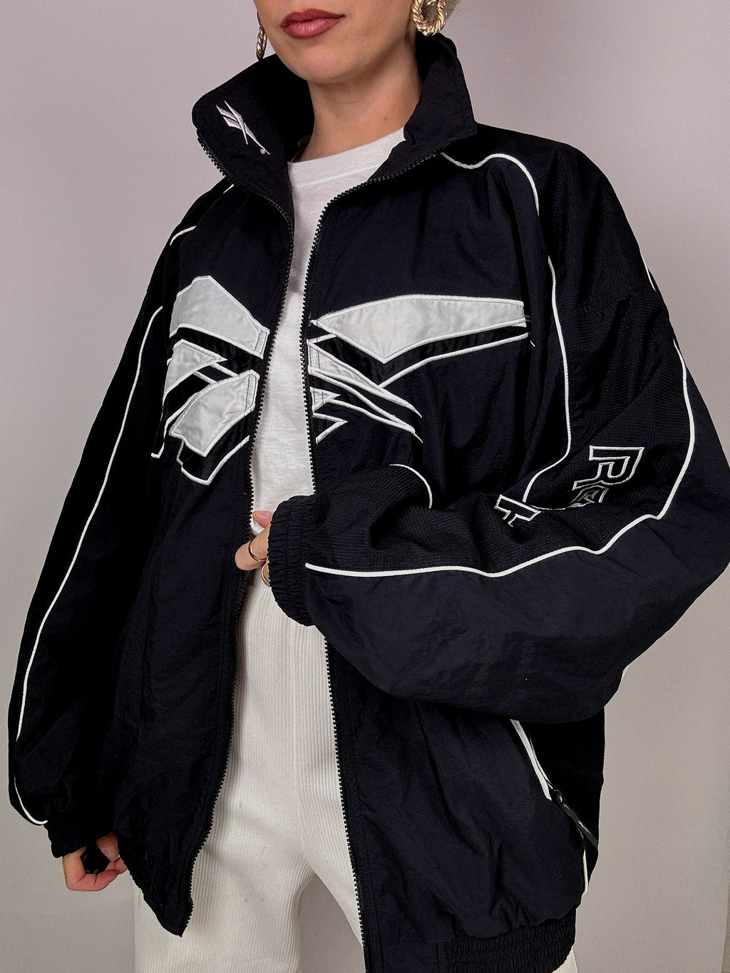 Reebok black and white jogging jacket