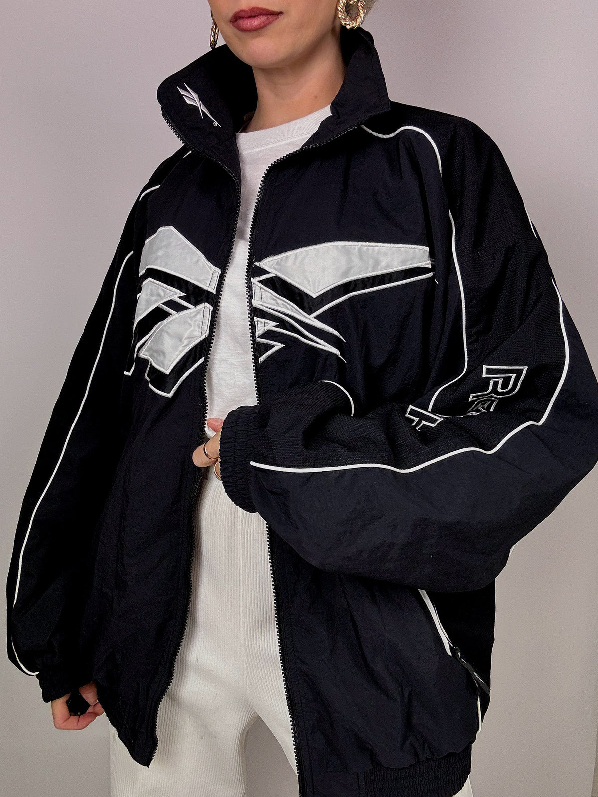 Reebok black and white jogging jacket