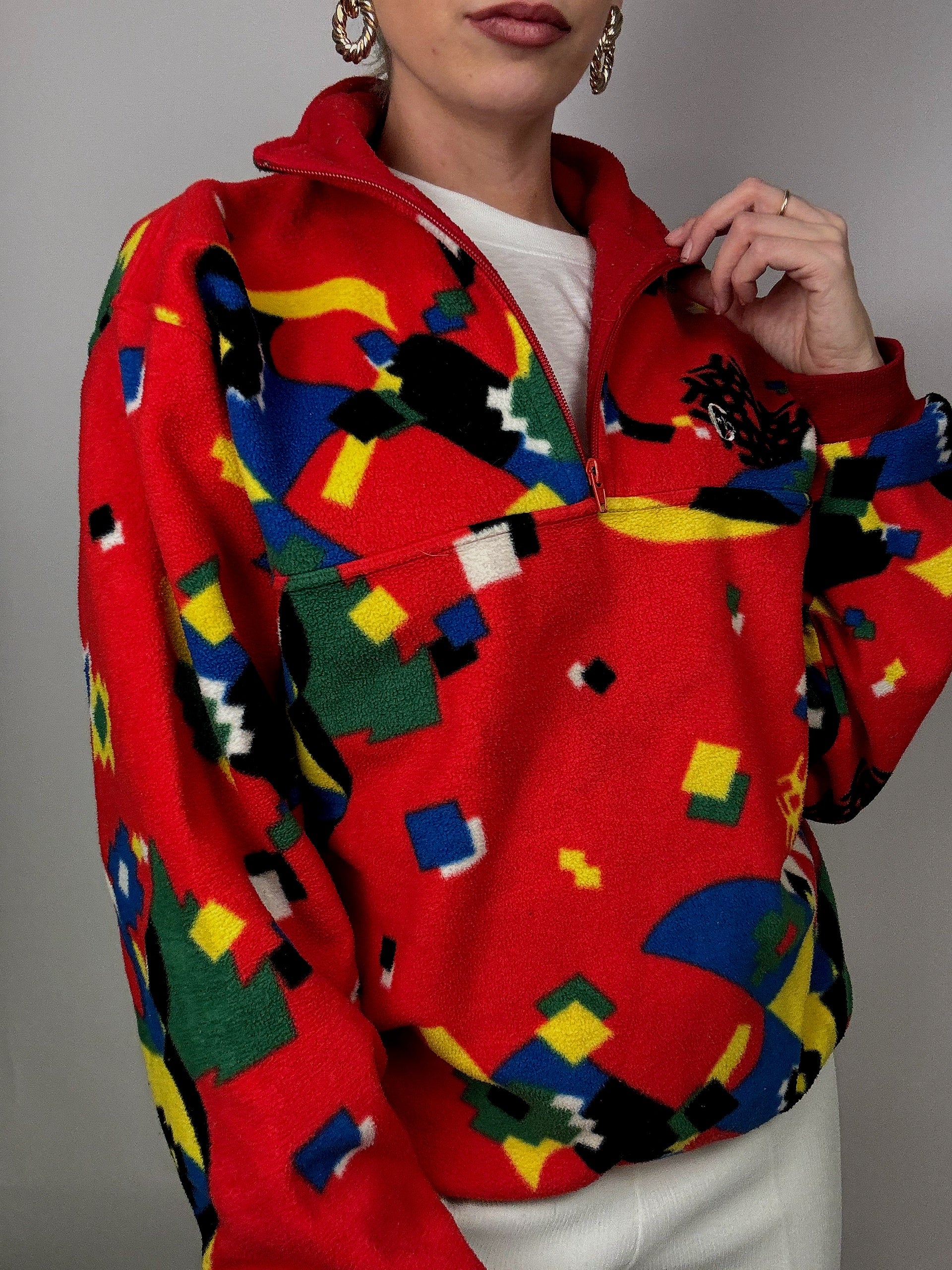 Rot/Gelb/Blau/Grün gemusterter Fleece mit Reißverschluss