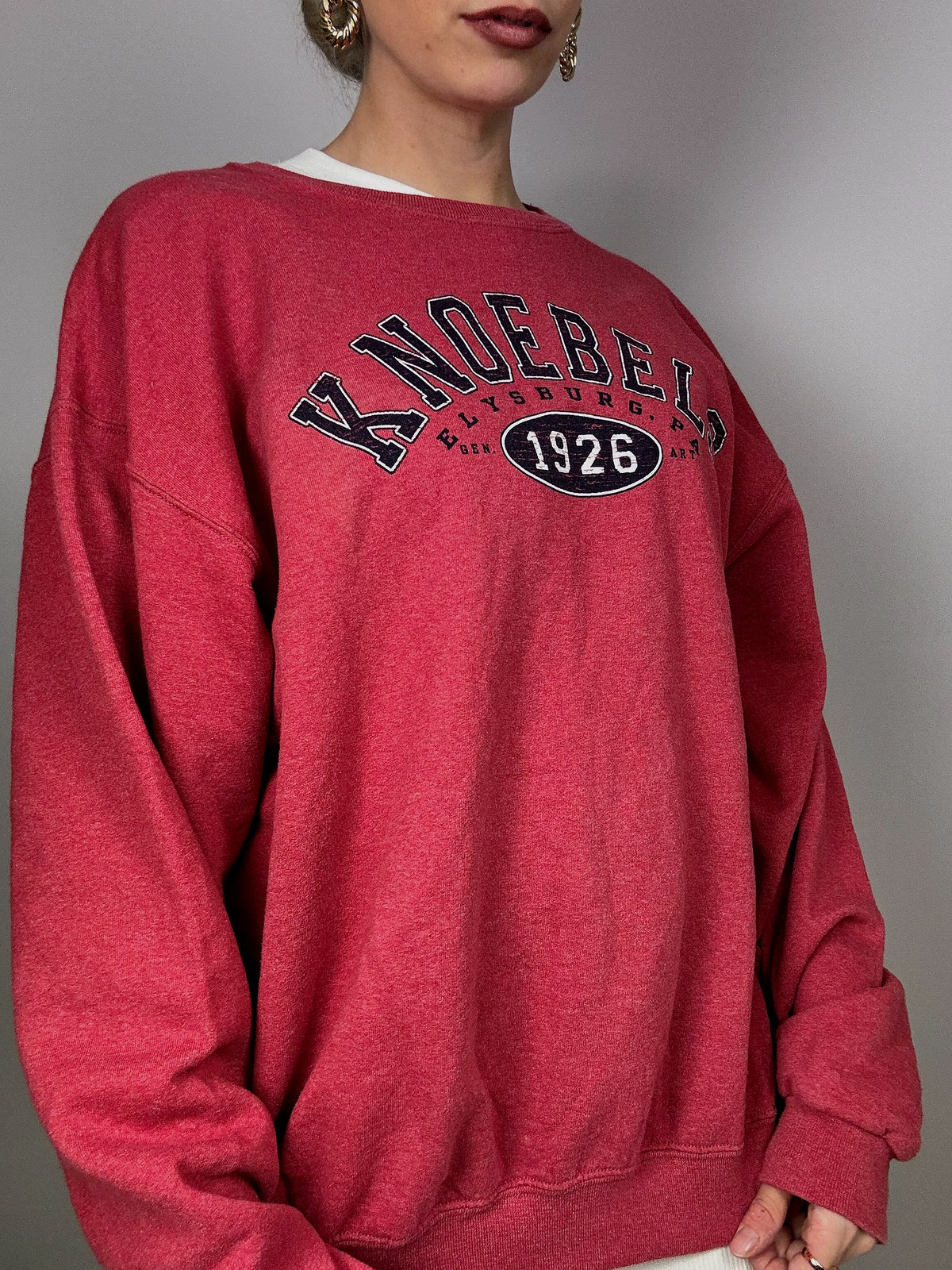 Knoebels light red sweater