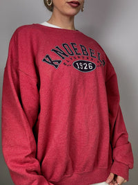 Knoebels light red sweater