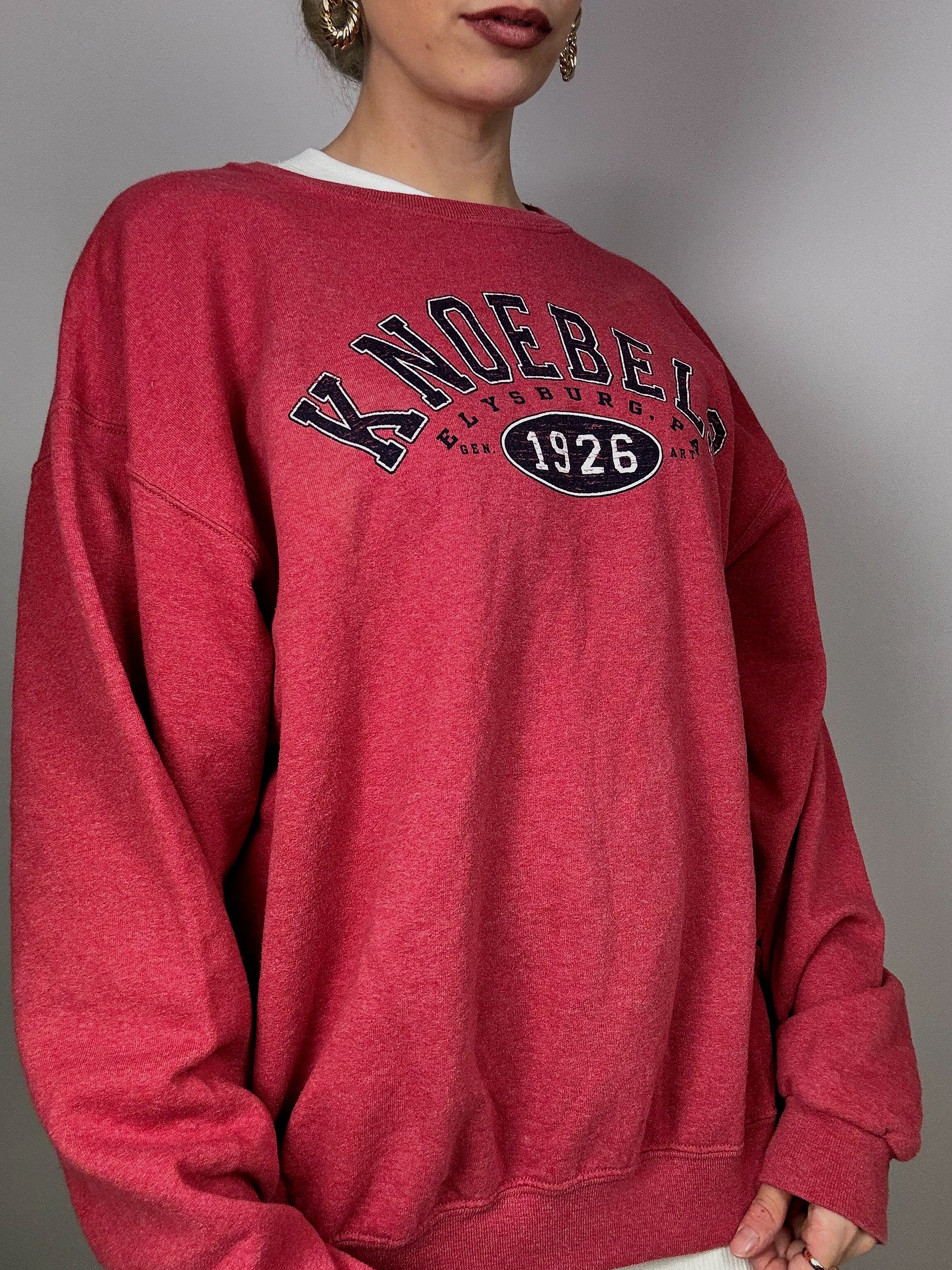 Knoebels light red sweater