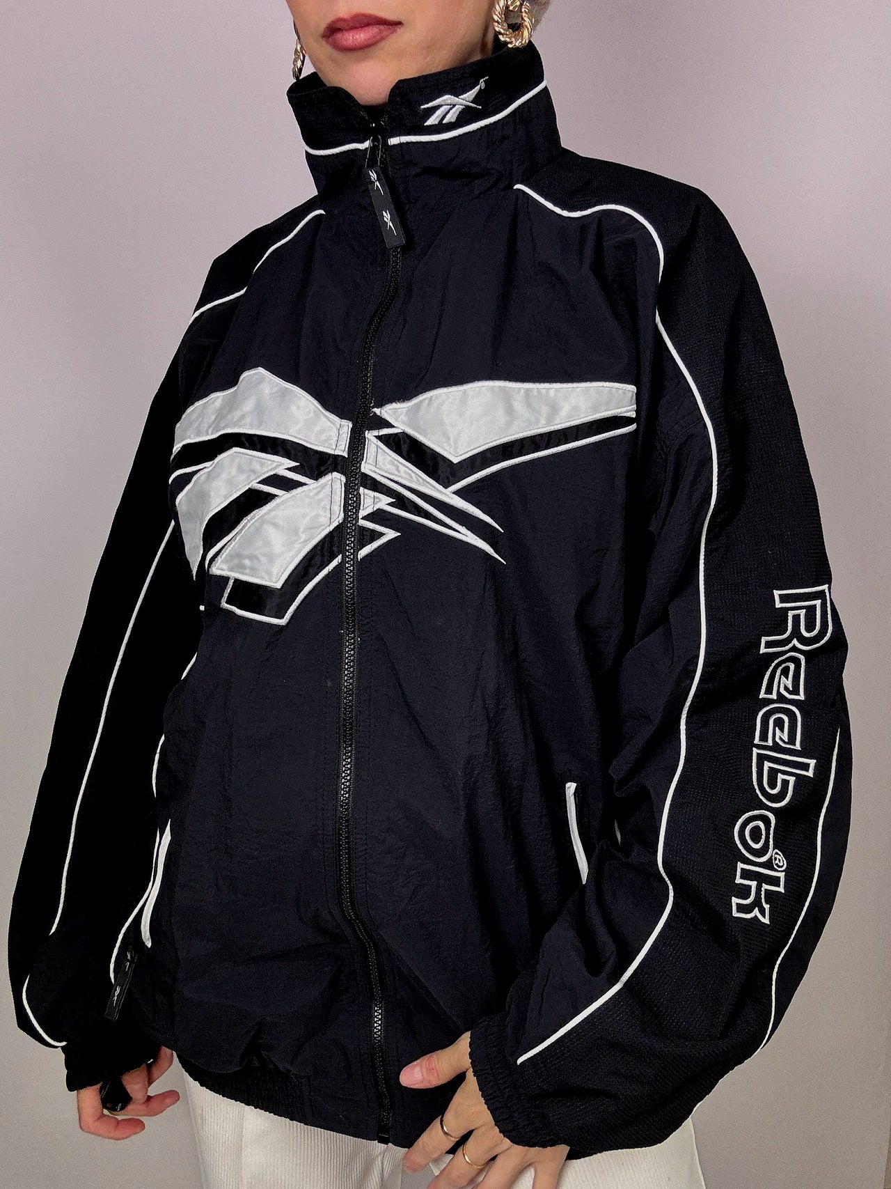 Veste jogging noir et blanc Reebok