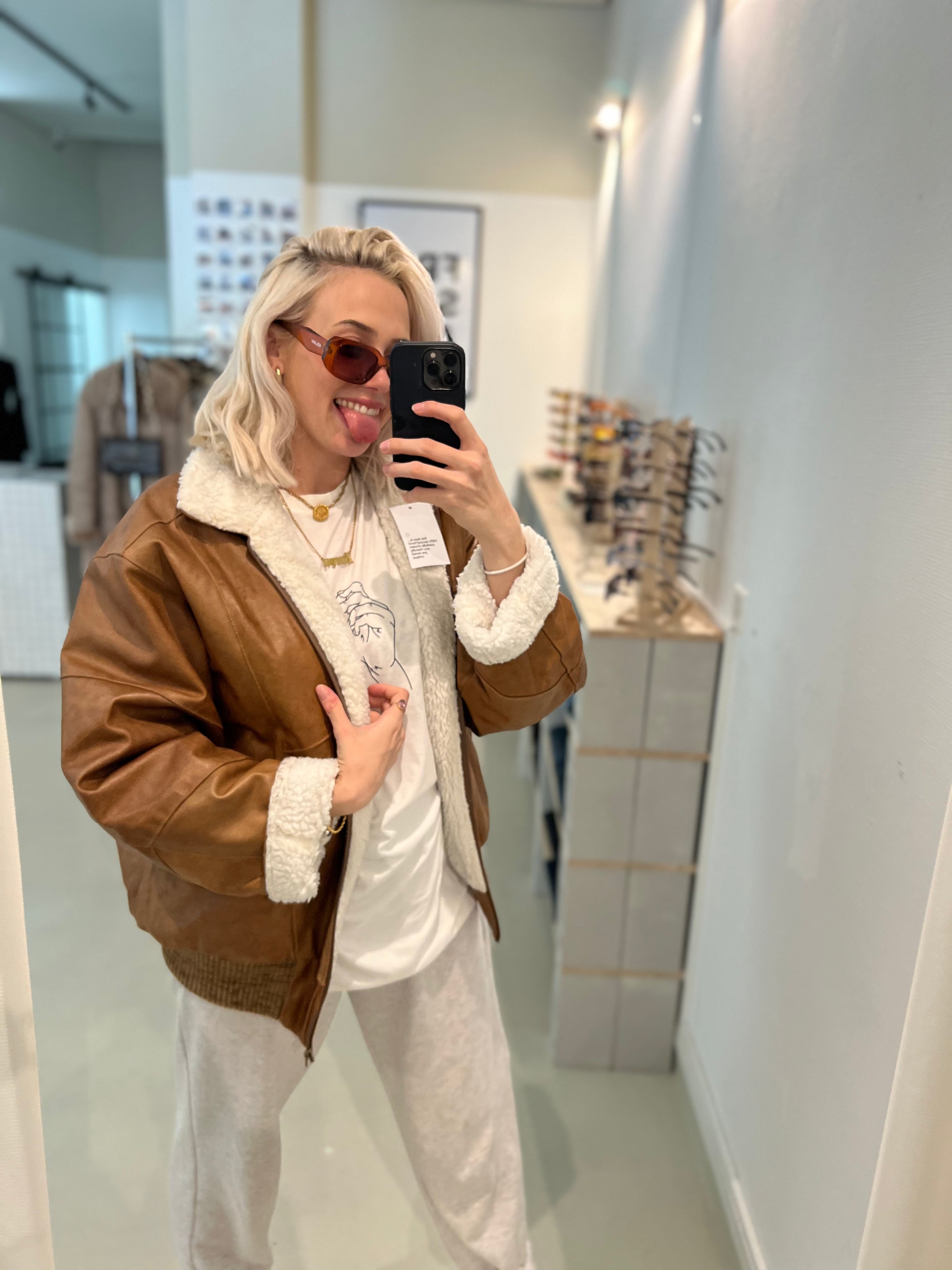 Braune und cremefarbene Vintage-Lammfelljacke M/L 