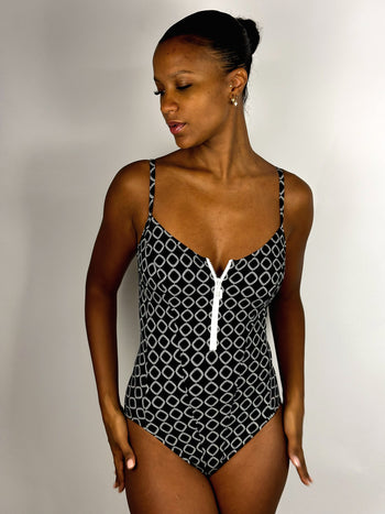 Black one-piece swimsuit with zipper and white pattern