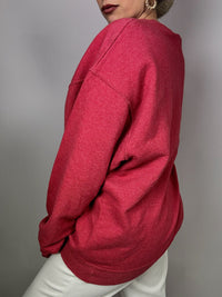 Knoebels light red sweater