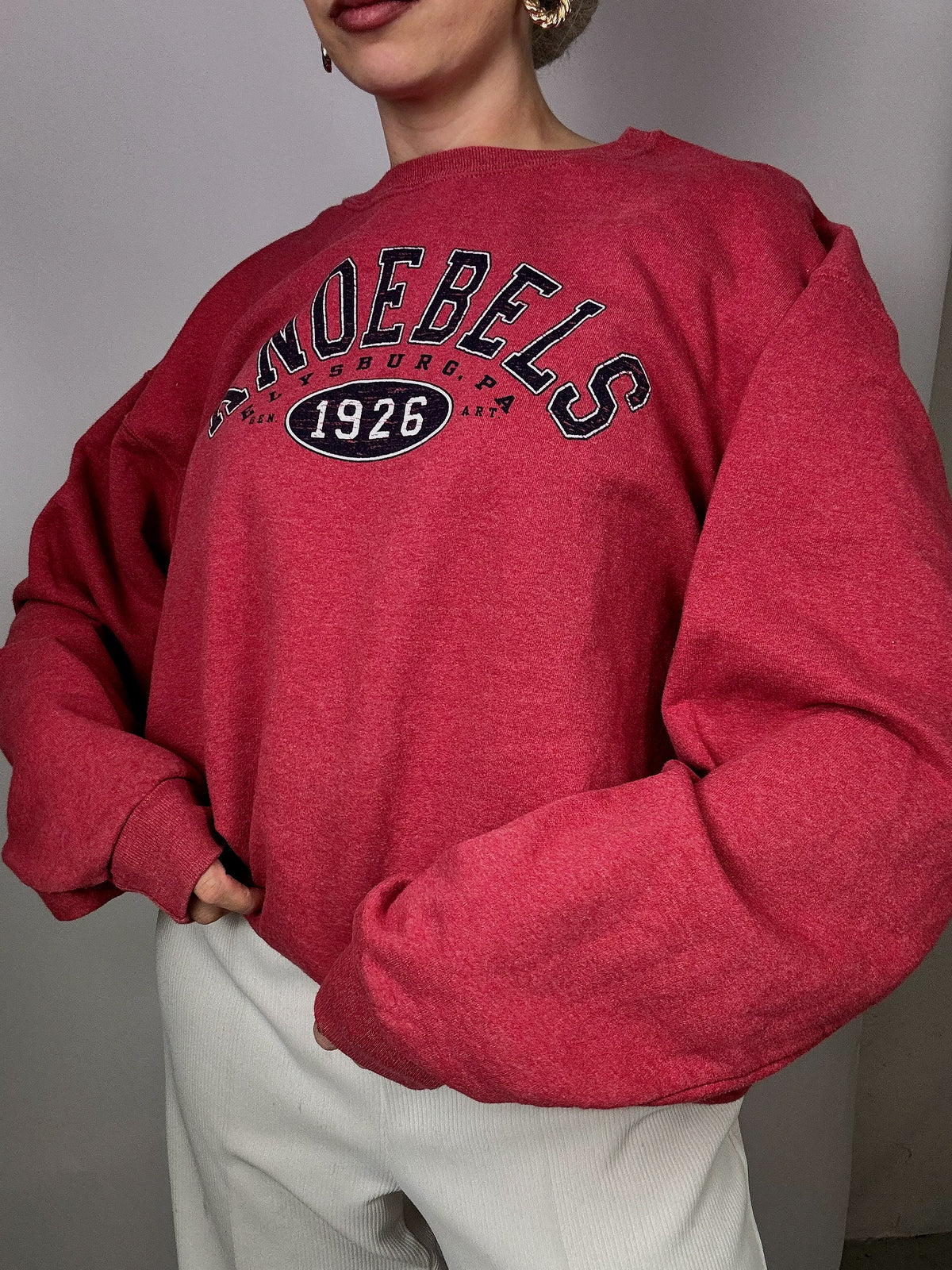 Knoebels light red sweater