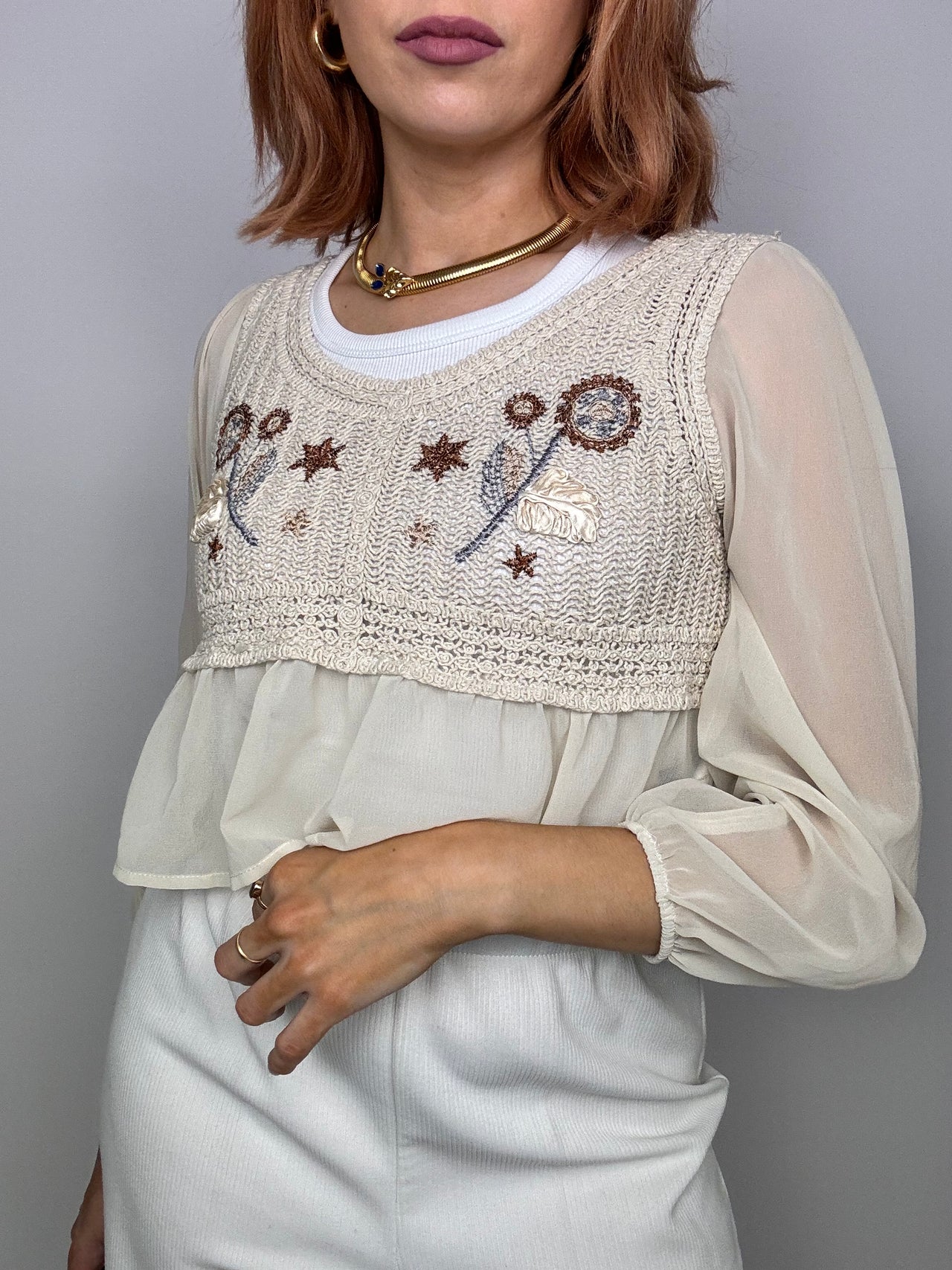 Beige knit blouse