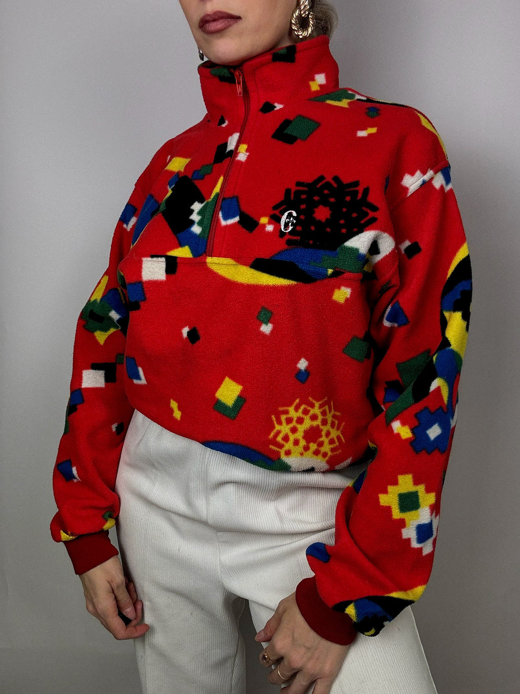 Rot/Gelb/Blau/Grün gemusterter Fleece mit Reißverschluss