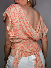 Pink blouse with beige pattern