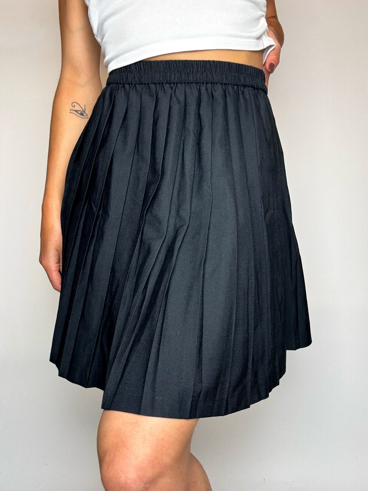 Jupe en laine plissée noire S vintage
