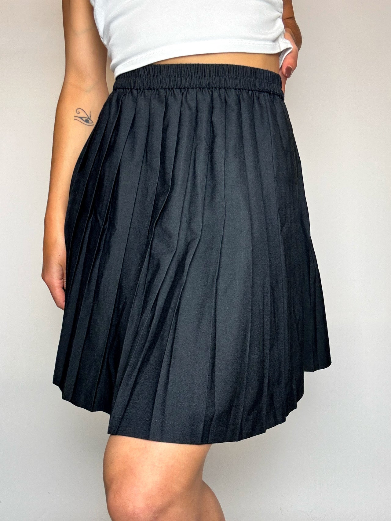 Jupe en laine plissée noire S vintage