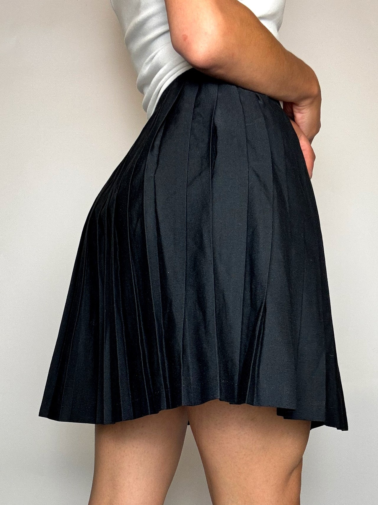 Jupe en laine plissée noire S vintage