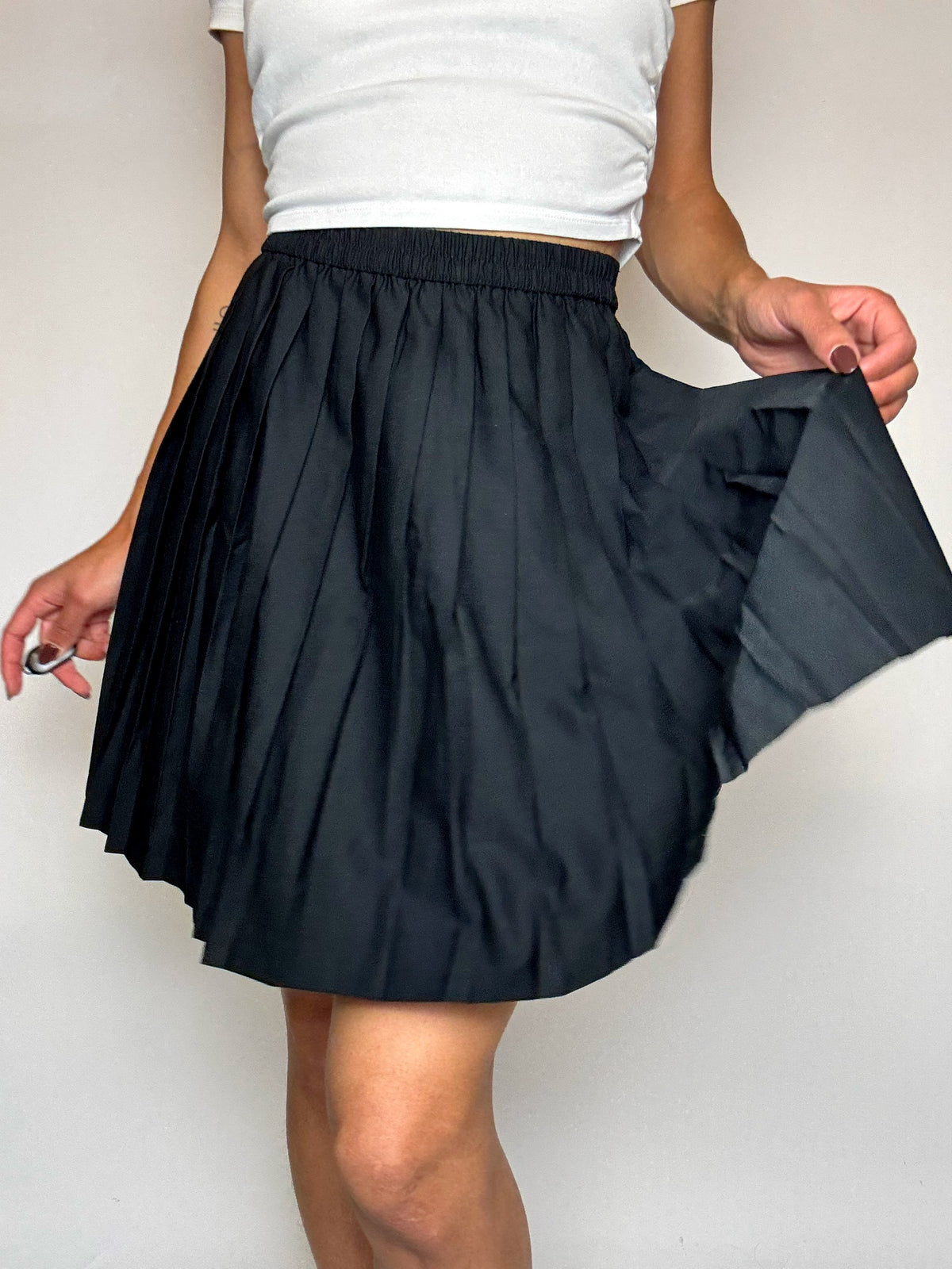 Jupe en laine plissée noire S vintage