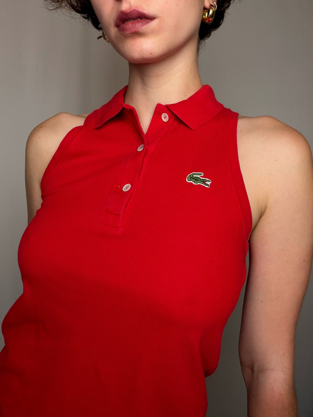 Polo sans manche rouge Lacoste S vintage