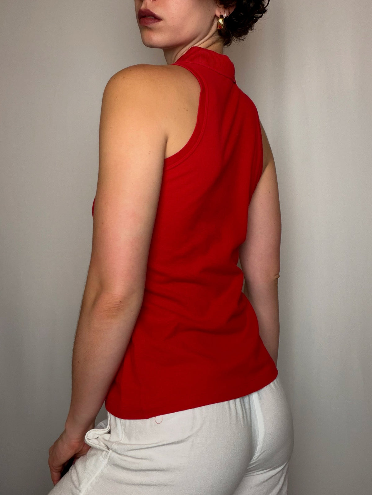 Polo sans manche rouge Lacoste S vintage
