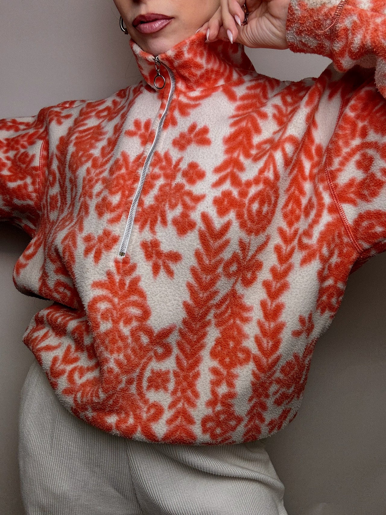 Cream and orange graphic fleece with zipped neck M vintage